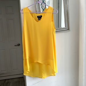 Sleeveless top with flair. Great with jeans.